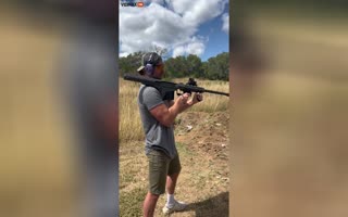 Guy Breaks his Ego Shooting a .50 Cal Rifle Sitting on his Shoulder