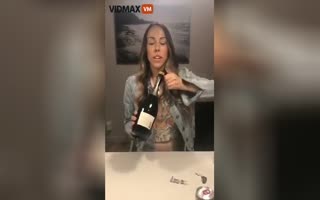 Woman Demonstrates How Not To Open A Bottle Of Bubblie During The Holidays