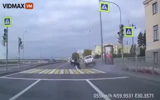 Car Ricochets off a Man Crossing when the Light was Green