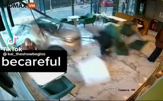 Woman Chilling At Cake Shop Gets Nailed By Car Crashing Through Window