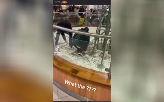 WTH? Two Men Jump Into Charity Fountain At Mall And Steal Pennies