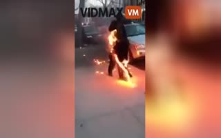 WTF!? Homeless man Casually Walks up the Street Whilst on Fire!