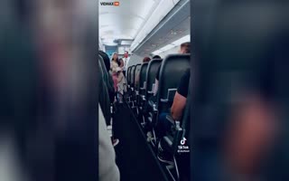 Flight Attendant With Arms Of A Bouncer Drags Unruly Passenger Off Flight 