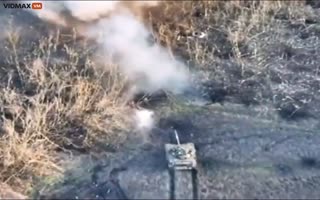 Ukrainian T-72 Tank Drives into a Russian Trenchline and Sends Body Parts Flying