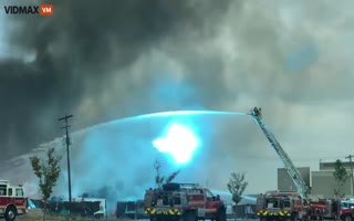 Firefighter Hose Rises into an Electric Wire and Things get Bright QUICK!