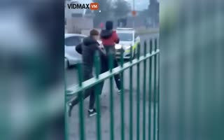 Irish Police Officer Flees in Fear after a Youth Driving a Car Repeatedly Rams Him as Others Surround the Car