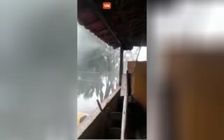 Man Goes on the Balcony to Record a Crazy Storm, House Gets Destroyed with His Family In It