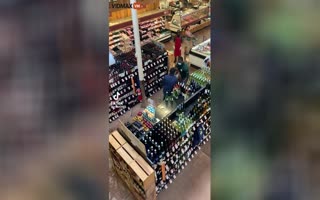Woman Smashes Some Liquor Bottles When She's Busted Shoplifting By Security