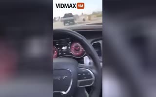 Guy Tries to Speed off an Offramp in a Hellcat and Flips It, Gets Trapped Inside