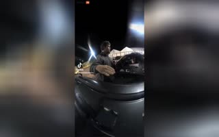 Cop Filmed Illegally Rummaging Through a Man's Car Flees When Confronted About the Crime