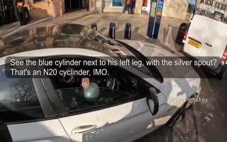 Guy Gets Busted Hitting a Balloon of Laughing Gas at a Red light in London