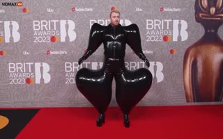 Sam Smith Just Showed Up To The Brit Awards Looking Like A Ballon Animal Made By A Crackhead Clown