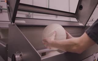 What in the Tron?! Wilson Makes a New Futuristic Basketball that Has no Air, Full of Holes