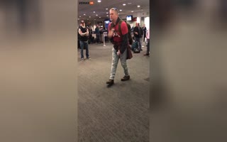 Dude Freaks Out At Airport, Creates His Own Eminem Soundtrack While He Does