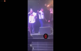 Husband Storms the Stage when a Performer Dry Humps Her in front of Thousands