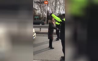 Chinese Karen Slaps the Sh*t out of a Police Officer on Duty! ZERO Repercussions from it!