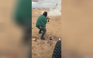 Dude Almost Loses His Head When Shooting An Oven With Explosives In It