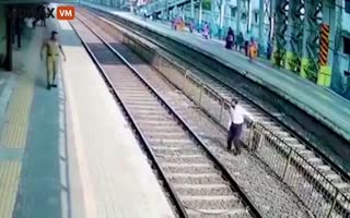 Idiot Hops Across the Train Tracks, Loses a Shoe and Nearly His Life Trying to Recover the Shoe