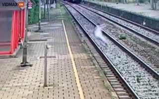 Woman Jumps In Front Of Speeding Train, Miraculously Walks Away Unharmed