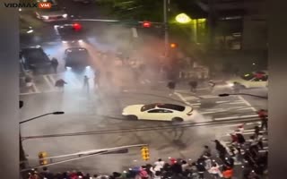 Total Madness At Georgia State University As A Massive Mob Jumps On Cars, Smash Windshields, Do Donuts