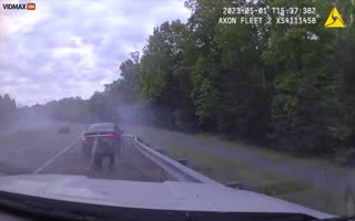 Out Of Control Car Crosses a Highway, Slams Into a Car Being Stopped for a Ticket, Clips a Cop