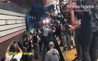 Protesters In NYC Stand On Subway Tracks, Blocking Train During Jordan Neely Protests