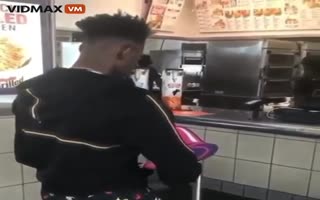 Punk Throws A Pack Of Firecrackers At Some KFC Workers