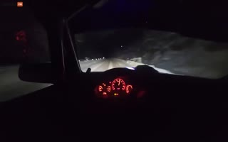 INSANE POV View of a Rallycar Driver Doing Breakneck Speeds at Night On Snow-Covered Ice Roads