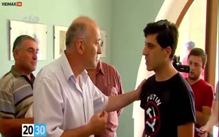 Young Man Gets The Soul Slapped Out Of Him By An Older Man For Wearing An Anti-Putin Shirt