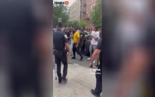 NYPD Attempts to Arrest a Few Hooligans Causing Problems, Get Surrounded and Attacked by Citizens