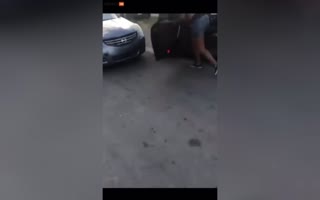 Girl Uses Her Car As a Battering Ram After A Girl Kicks Her Hood, Breaks Her Leg