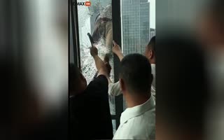 High-Rise Heroics: Office Workers Save Hanging Worker from 34th-Floor Peril