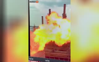Lighting Strikes an Oil Storage Tank, Slow Motion Video Shows it Exploding