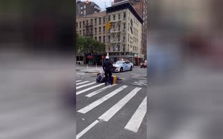 Delivery Driver Knocked Down for Joe Biden's Motorcade in Manhattan: Symbolic Image of the Failed Fake Pres.