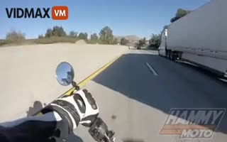 Bikers Life Flashes Before His Eyes, Pulls Some Movie Sh*t And Slides UNDER A Semi on a Highway During a Crash