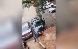 Dumb Cop Nearly Gets Crushed Whilst Trying to Arrest Someone, Car Wasn't Put in Park, Nearly Crushes Her