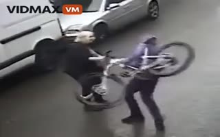Thief Thinks Robbing This Bike From An Elderly Lady Would Be Easy...He Would Be VERY Wrong