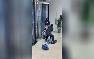 Security Guard Tackles Man Trying To Steal A Sack Of Clothes In Manhatten