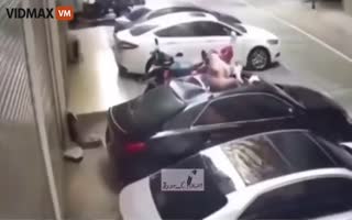 Woman Making Whoopee On The Balcony Falls Several Floors On Top Of Car