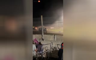 Bus Race Crash Nearly Sends An Entire Section Of The Crowd To Heaven