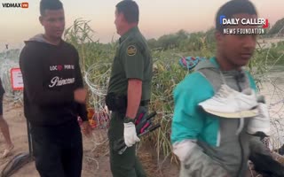 WTH? Illegals Are Fist-Bumping Border Patrol After Getting Through Razorwire And Illegally Entering The Country
