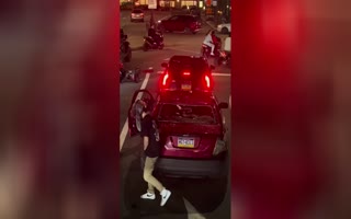 Punk Motorcyclist Jumps On Car And Smashes Rear Window With Child Inside In Philly