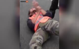 French Cop Deals With Eco-Nuts Glued To The Road The Painful Way