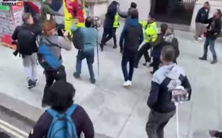 Israeli Support Holding A Flag Is Attacked By Pro-Hamas Supporters Shouting Allah Akbar In London