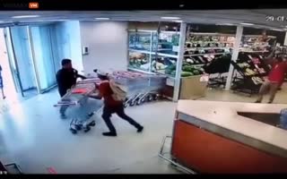Shoplifter Gets Taken Out With A Perfectly Thrown Bottle Of Coke