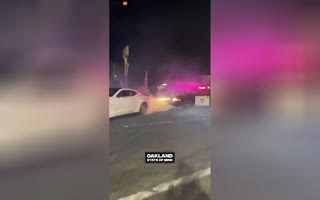 Oakland Cop Car Gets Hi By Vehicle Doing Donuts At Illegal Street Takeover, Cops Do Nothing