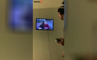 Dude Tries To Destroy Broken TV, Ends Up Fixing It