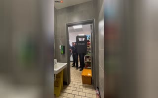 Man Gets A Group Of Armed Police Go At Him While He's Taking A Dump