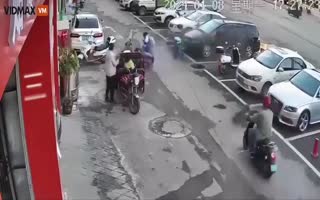 Chinese Kid Tosses Firecracker Into Sewer, Goes For A Magic Carpet Ride