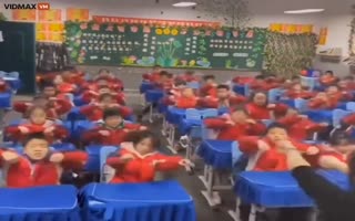 This Video Of Chinese Kids Fist-Banging In Unison To Metal Is Oddly Satisfying 